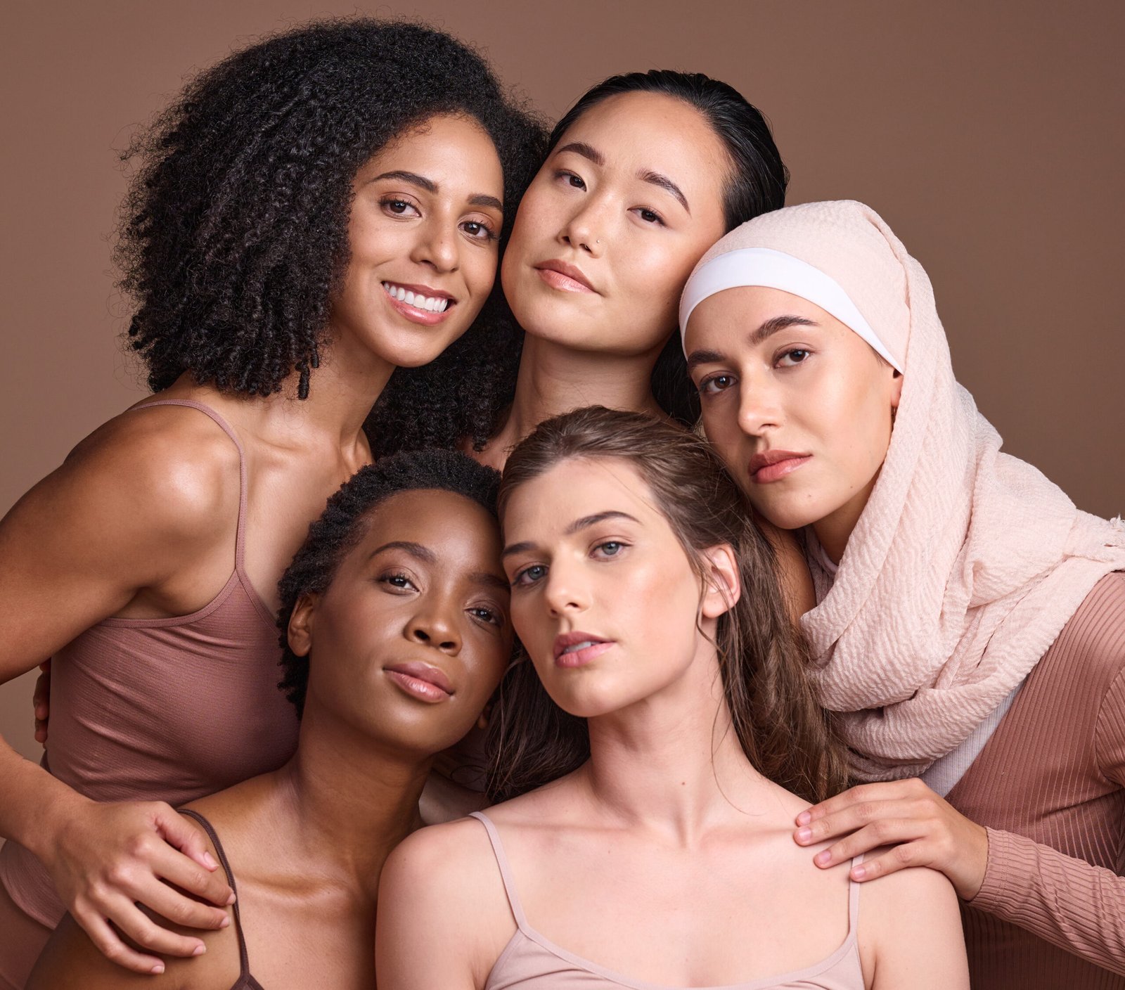 Diversity, beauty and portrait of a group of women in studio for skincare, makeup or cosmetic routi.